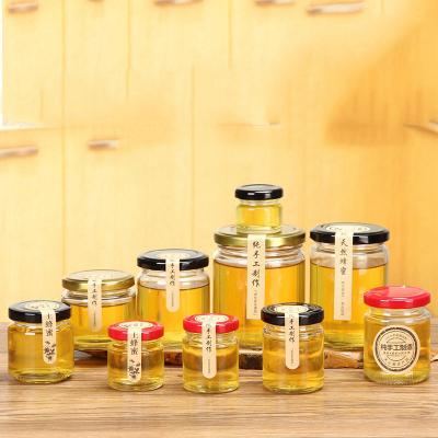 China Custom Food 25ml 50ml 75ml 100ml 195ml 240ml 350ml 500ml Round Honey Storage Jar SauceJarWith Screw Glass Tinplate for sale