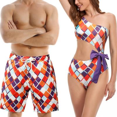 China Logo Couples Matching Printed Honeymoon Anti-UV Private Swimsuit Bathing Vacation Swimwear Tropical Beach Wear for sale