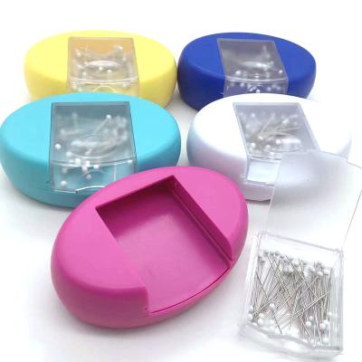 China Plastic + Hot Selling Portable Needles Pin Cushion Pin Plastic Glass Head Cushion Pin Cushion Oval Cute Magnetic Metal+ Magnet Pin Cushion for sale