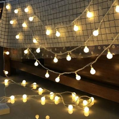 China Copper light 50 LED Fairy IP65 remote Battery 8 Modes Outdoor Globe Frosted White Ball String Lights for sale