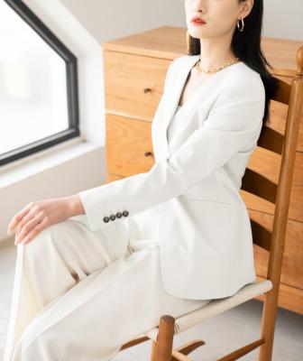 China Anti-wrinkle Fashion Ladies Swap White V-Neck Suit With Lose Pants for sale