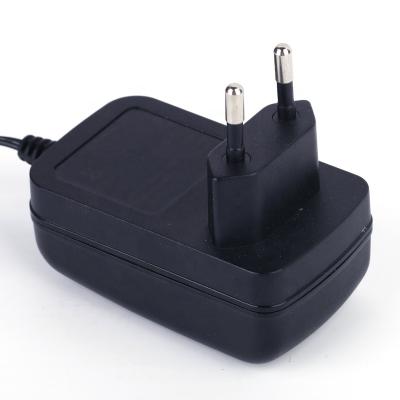 China Electronic Products 24W 12v 2a DC to AC Adapter with EU/US/AU/UK Plug for LED Strips, CCTV Camera, DVR for sale