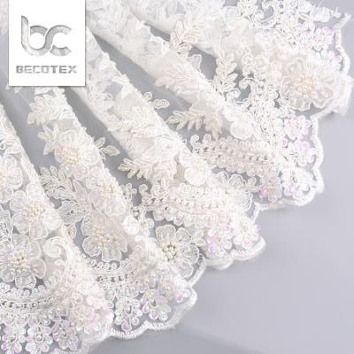 China Beautiful Anti-static White Beaded Pearl Wedding Lace Fabric For Bridal for sale