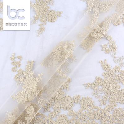 China Useful cheap new design polyester ribbon embroidery lace fabric anti-static for sale