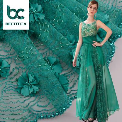 China 2021 Sustainable Net Forest Green Beading Embroidery Wedding Lace Fabric With Handwork 3D Flowers for sale