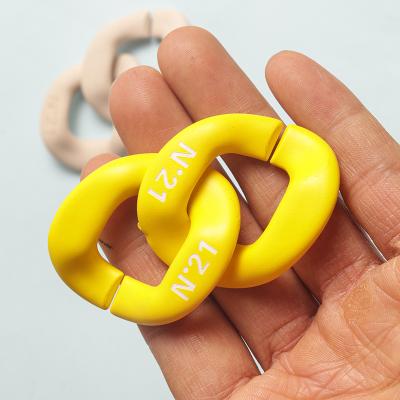 China Custom Cuban Ring Plastic Resin Restraint Link Laser Logo Printed Matte Acrylic Charms Bag Parts Accessories REWIN 42mmx48mm for sale