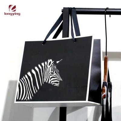 China Recyclable Custom Black Creative Fashion Patterns Paper Bag Nature Style Animal Art For Products Green Paper Bags With Your Own Logo for sale