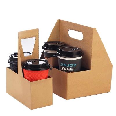 China Disposable Paper Cup Holder Disposable Cold Drink Take Away Paper Carrier 2/4 Pack Carriers With Logo Customized for sale