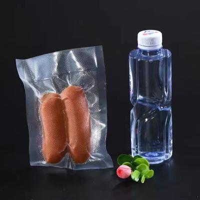 China Barrier PA Nylon PE Food Grade Laminated Sealed Embossed Plastic Vacuum Squeeze Sausage Meat Storage Packaging Vacuum Bags for sale