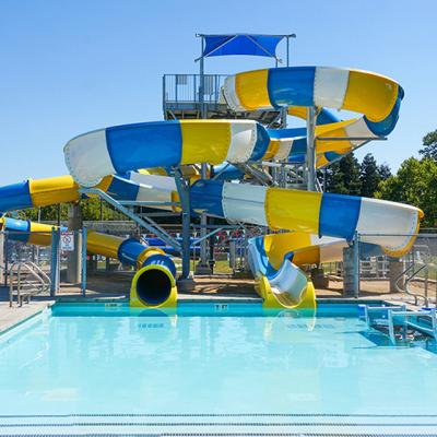 China Amusement Park Swimming Pool Water Play Equipment Fiberglass Spiral Slide Parts Big Water Slides for sale