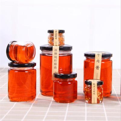 China Mini small frutta del prato empty cheap stocked 20ml jam jar glass with metal screw lid for sale