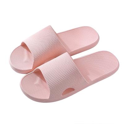 China Damping 2022 high slippers women's market PVC one-piece indoor elastic home couples sandals and slippers wholesale for sale