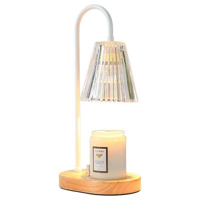 China 2022 New Design Home.hotel.lighting Decorative Korean Electric Candle Cast Iron Fragrance Censer Warmer Table Lamp With Halogen Bulbs Desk Lamp for sale