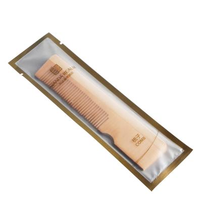 China Wholesale High Quality Eco-friendly Hotel Exquisite Disposable Amenities Travel Hair Wooden Comb for sale