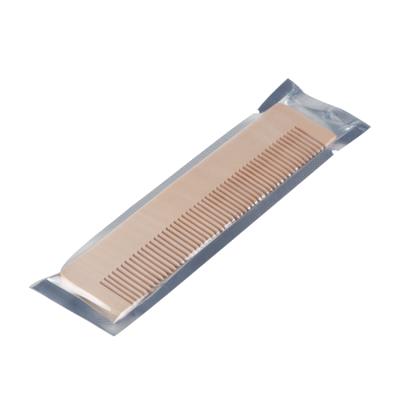 China China Eco-friendly Exquisite Disposable Hotel Amenities Travel Wooden Hair Comb Brush for sale