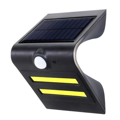 China Stylish Tempered Glass Energy Saving Solar Garden Lights Small Outdoor Waterproof Solar LED Wall Light PIR Motion Sensor Rechargeable Nice for sale