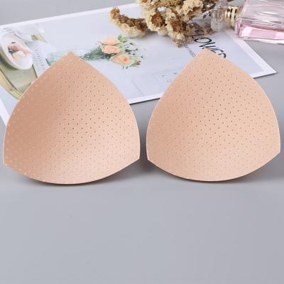 China Comfortable triangle sponge pads breast bra bikini inserts bra pads inserts women's sports comfortable cups bra insert for sale