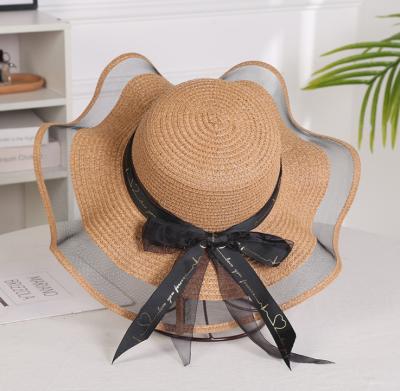 China 2021 Character Summer Elegant Women's Beach Bowknot Beach Bowknot Beach Hat Mesh Straw Hat Wholesale Eaves Big Hat for sale