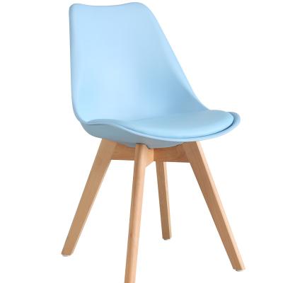 China Modern Design Modern Home Furniture PP Seat Dining Chair Wood Cafe Plastic Leg Chairs for sale