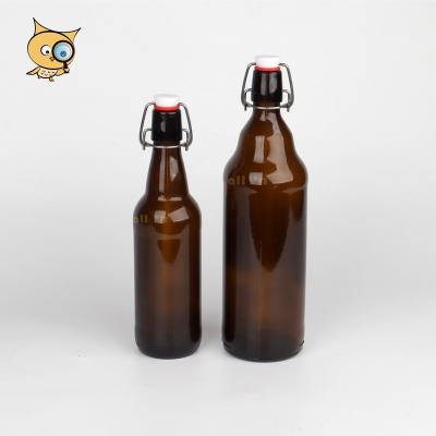 China Drink ALL IN 1000ml Amber Glass Bottle Wholesale Hot Sale Custom Beer Bottle With Easy Swing Top Cap Open End for sale