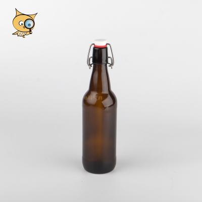 China Drink ALL IN 500ml Amber Glass Bottle Wholesale Hot Sale Custom Beer Bottle With Easy Swing Top Cap Open End for sale