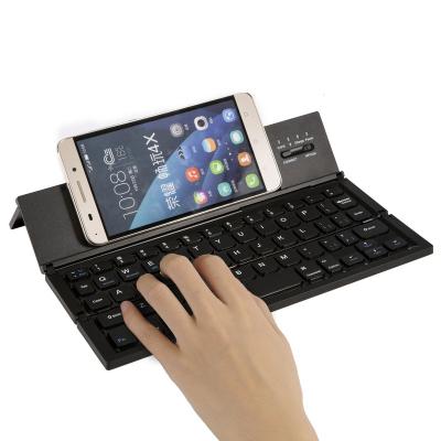 China OEM 62 Connector Style Wireless Keypad Portable Folding Mini Keyboard Wireless Keypad For Mobile Phone for sale