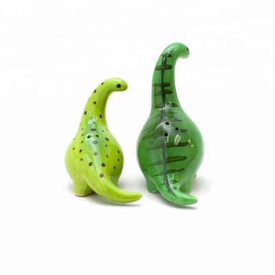 China Sustainable Dinosaur Shape Ceramic Salt and Pepper Shaker Spice Jar Set of 2 for sale