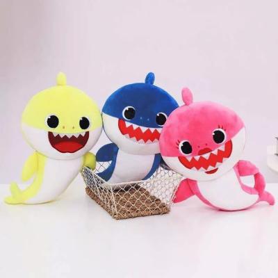 China Soft Smile Blue Pink Blue Yellow Cute Shark Cotton LED Singing Music Sound Stuffed Plush Animal Dolls Baby Plush Toys for sale