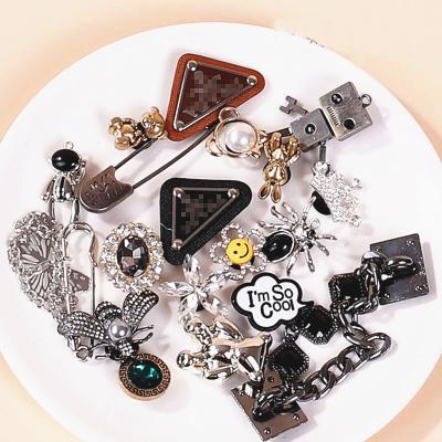 China Clog Charm Designer Metal Cheap PVC Shoe Charms Customized Luxury Shoe Charm For Croc Shoe Sandal Slipper for sale