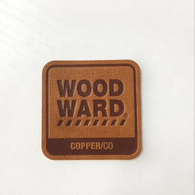 China Factory Supplier Eco-friendly Chinese Custom Embossed Logo Fake Leather Labels Chinese Directly For Handbags for sale