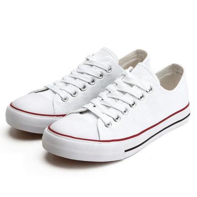 China Wholesale low cut round vulcanized white black white women flat plain loose canvas shoes unisex sneakers shoes for sale