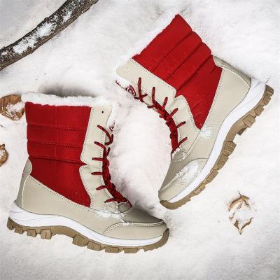 China 2021 New Autumn Outdoor Warm Leather Mid-tube Ladies Winter Warm Boots Fashion Woman Outdoor Rise Snow Boots for sale