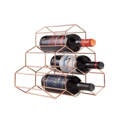 China Metal Freestanding Rack Shelves Modern Wine Glass Bottle Gold Metal Wine Rack 6 for sale