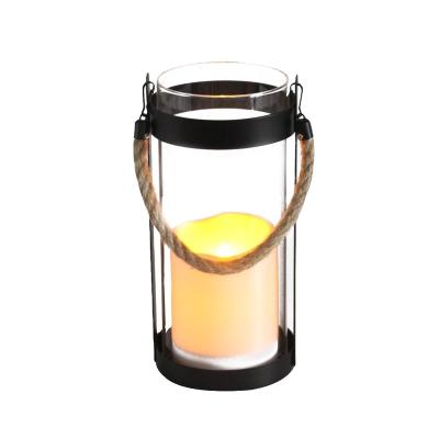 China Factory Direct IP44 Waterproof Decorative Lamps For Festivals LED Solar Candle Light Metal Candle Yellow Glass Lantern for sale