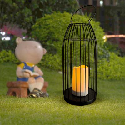 China Outdoor Decorative Solar Garden LED Candle Holder Wrought Iron Garden Metal Lantern Solar Lamp for sale