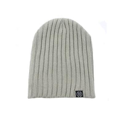 China Custom JOINT 100% Cotton Woven Label Knitted Beanie Hats for sale