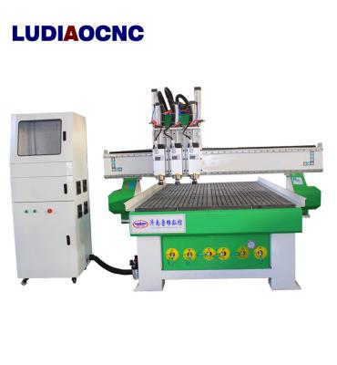 China Three spindles ATC CNC wood router machine 1325 automatic tool change CNC router machine for sale