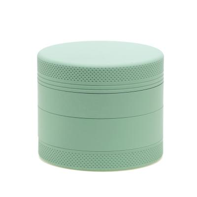 China Custom Logo Soft Touch 63mm-4 Rubber Aluminum Grinder Wholesale Durable 2.5 Inch Manual Herb Grinder Silicone Coating for sale