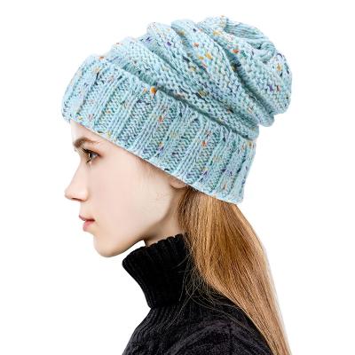 China COMMON Winter Confetti Slouchy Confetti Chunky Soft Cable Knit Women's Messy Bun Beanie Hats for sale