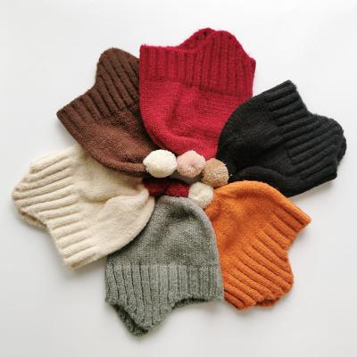 China JOINT Wholesale Cute Winter Kids Baby Knit Ear Flap Bomber Hats for sale