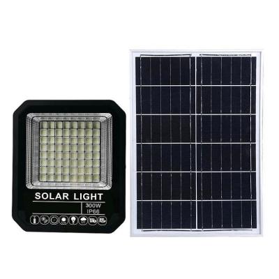 China Outdoor Garden IP67 Solar Powered Remote Wireless Battery Panel 200w 300w 400w 600w 100w Solar Led Flood Light for sale