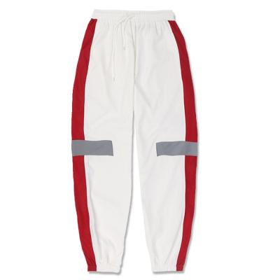 China Fashion Comfortable QUICK DRY Reflective Tape ZUJA Unisex Hip Hop Reflective Pants for sale