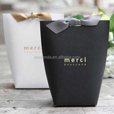 China Recyclable High Quality Custom Gold Foil Stamping Luxury Black Paper Bag Recycled Cardboard Small Gift Bag With Ribbon for sale