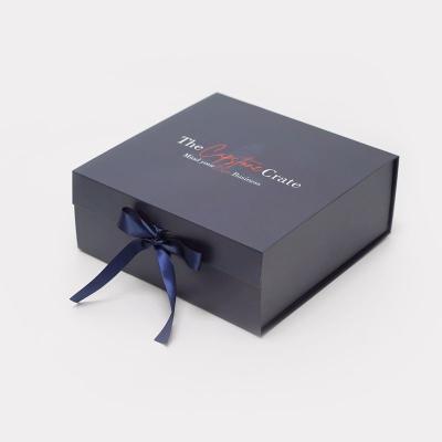 China Recyclable Luxury Custom Apparel Packaging Gift Box With Ribbon Closure Navy Blue Matt Black Magnetic Collapsible Gift Box for sale