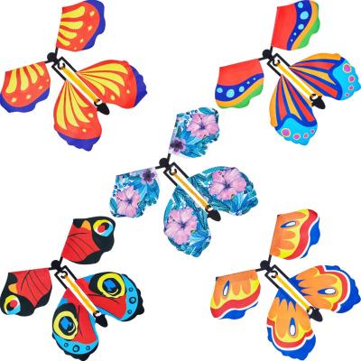 China Plastic Magic Butterfly Flying In The Book Fairy Elastic Band Wind Powered Butterfly Toy Great Surprise For Wedding And Birthday Gifts for sale