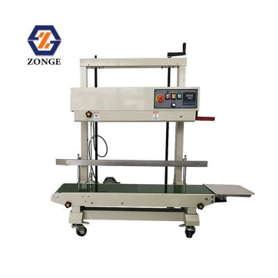 China FR-1100 Easy Operation Vertical Automatic Continuous Tape Sealing Machine For Rice Pack Bag for sale