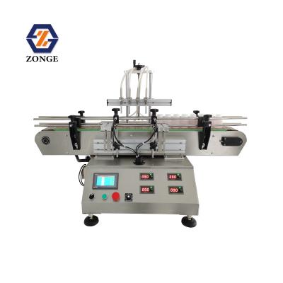 China Automatic Food Desktop 4 Nozzles Oral Liquid Bottles Magnetic Pump Filling Machine for sale