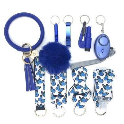 China New Designer Waterproof With Alarm Safety Woman Self-defense Key Chain Set Self-defense Supply Security Key Chain Set for sale