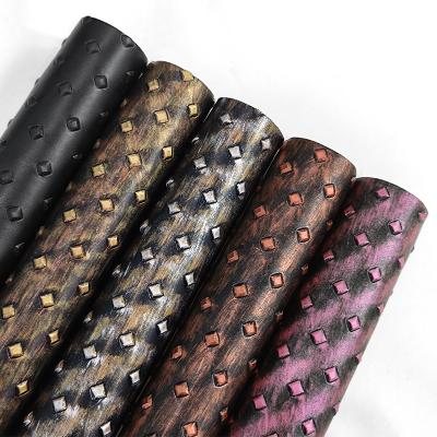 China Waterproof Vintage Faux Leather Roll Faux Leather Plaid Bump Pattern Vintage Metallic Embossed Fabric For Shoes Purses Wallets for sale