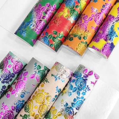 China Rainbow Vintage Flower Waterproof Faux Leather Embossed Rose Pattern Synthetic Fabric For Upholstery Sewing DIY Crafts Material for sale